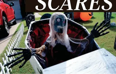  ?? DOUG HOKE/THE OKLAHOMAN ?? Ronnie and Rebecca Coleman's yard is ready for Halloween on Chimney Hill in Edmond on Friday. They say they usually have around 400 children come by to trick-or-treat.