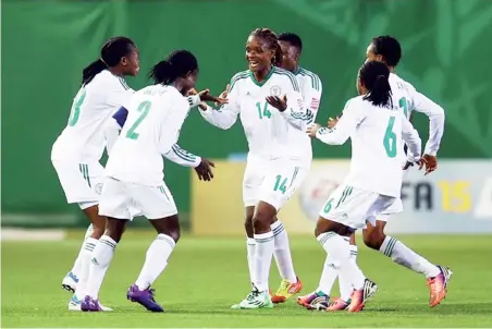  ??  ?? Osarenoma Igbinovia (C) of Nigeria celebrates her team’s goal with team mates during the FIFA U-20 Women’s World Cup Canada 2014 group C match against Mexico at Moncton Stadium.