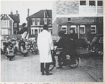  ??  ?? Ian Newman at the rear of West Street shop with Wildcat works scooters in the background.