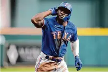  ?? Brett Coomer/Houston Chronicle ?? The Rangers’ Adolis García listens for the boos after hitting a solo home run against the Astros in the eighth inning of Game 7.