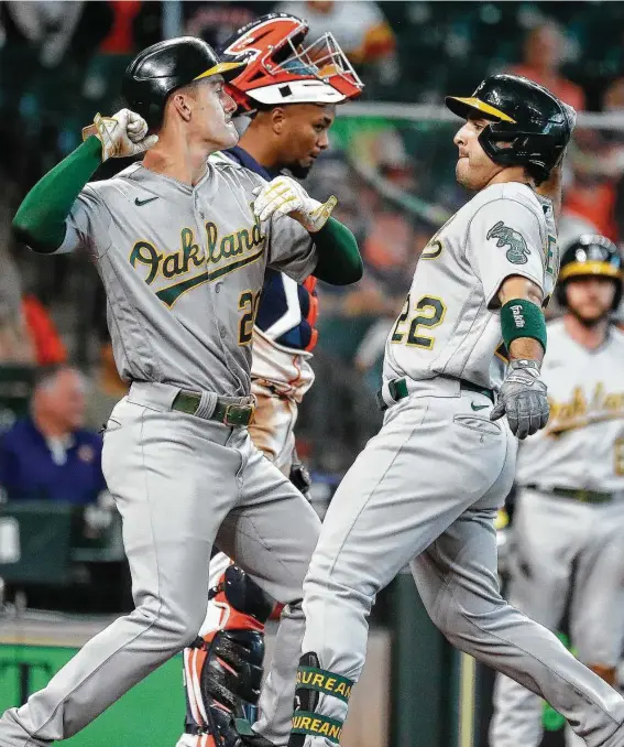  ?? Karen Warren / Staff photograph­er ?? The A’s rode homers, including a fifth-inning blast by Ramon Laureano (22) on Saturday, to a series win over an Astros team that’s suddenly stumbling after a hot start.