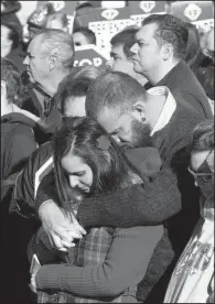  ?? Arkansas Democrat-Gazette/MELISSA SUE GERRITS ?? Jeffrey Crowder hugs his wife, Kassle, during a prayer Sunday at the 2016 March for Life rally at the state Capitol in Little Rock.