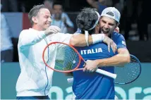  ?? Photo / AP ?? The Italians are all smiles after ousting the United States.