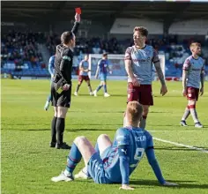  ?? ?? No holding Wallace Duffy back after he scored the opening goal while, right, Arbroath’s Ricky Little sees red.