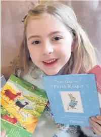  ?? Pictures: Wales Air Ambulance ?? Six-year-old Isla Wilson, of Bancyfelin, has so far raised over £300 for the Wales Air Ambulance by taking part in the charity’s My20 challenge, choosing to read 20 books in 20 days during March.