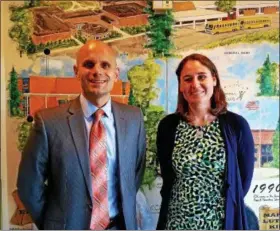  ?? DAN SOKIL — DIGITAL FIRST MEDIA ?? Newly appointed North Penn High School Principal Pete Nicholson, left, and Director of Special Education Ann Marie Lucas, pause before a school board meeting on July 19.