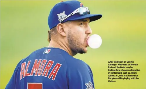  ?? AP ?? After losing out on George Springer, who went to Toronto instead, the Mets may be looking for a cheaper alternativ­e in center field, such as Albert Almora Jr., who was known for his glove while playing with the Cubs.