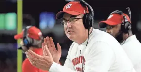  ?? MIKE EHRMANN/GETTY IMAGES ?? Paul Chryst’s UW team went 13-1 last season.