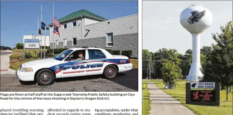  ?? PHOTOS BY TY GREENLEES / STAFF ?? Flags are flown at half staff at the Sugarcreek Township Public Safety building on Clyo Road for the victims of the mass shooting in Dayton’s Oregon District. Bellbrook High School on Upper Bellbrook Road in Sugarcreek Township.