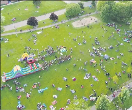  ?? COURTESY CITY MADISON HEIGHTS CITY ?? This aerial view picture of Civic Center Park in Madison Heights shows an event their last year before the coronaviru­s pandemic. On Saturday, a socially distanced music festival will take place there.