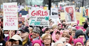  ?? FRANK GUNN/THE CANADIAN PRESS ?? Thousands of protesters marched in support of the Women’s March on Washington, in Toronto on Jan. 21.