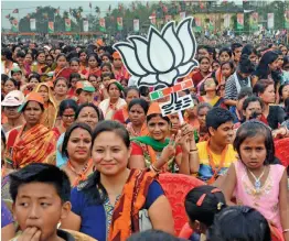  ?? — PTI ?? BJP supporters during Prime Minister Narendra Modi’s election campaign rally ahead of Tripura Assembly Elections in Unakoti on Thursday.