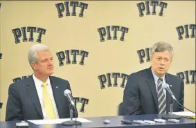  ?? Post-Gazette ?? SEPT. 18, 2011 Chancellor Mark Nordenberg, right, and athletic director Steve Pederson field questions on the decision to move Panthers athletics to the ACC.