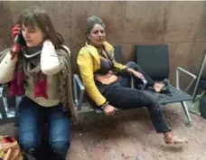  ?? KETEVAN KARDAVA/THE ASSOCIATED PRESS ?? Nidhi Chaphekar, a 40-year-old Jet Airways flight attendant from Mumbai, right, and another woman were wounded in bombings at Brussels airport.