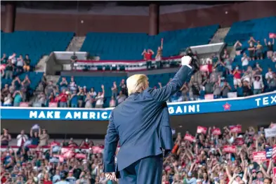  ?? AP Photo/Evan Vucci ?? ■ President Donald Trump arrives on stage to speak at a campaign rally at the BOK Center on Saturday in Tulsa, Okla.