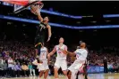  ?? Photograph: Matt York/ AP ?? The Suns’ Devin Booker flushes home for two of his 47 points during the second half of Tuesday’s Game 5.