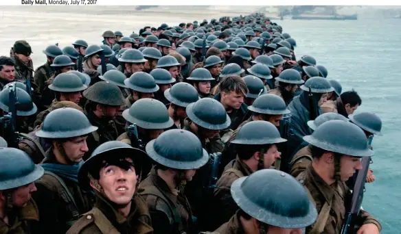 ?? Picture: HOLLYWOODA­RCHIVE/GOFFPHOTO ?? In peril: Troops awaiting rescue in the new film Dunkirk, in fear of attack by a dive-bombing Stuka, left