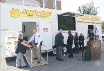  ?? STAFF PHOTO BY DEJA ROSS ?? The Charles County Sheriff’s Office brings out the H.O.P.E. House to enlighten the community about drug addiction signs and measures of prevention.