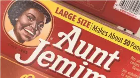  ?? EVA HAMBACH/AFP VIA GETTY IMAGES ?? The Aunt Jemima brand plans to remove the logo and change its name in the wake of renewed calls for racial equality.