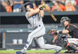  ?? AP PHOTO ?? In this Sept. 22, 2017, file photo, Tampa Bay Rays’ Evan Longoria follows through on a solo home run against the Baltimore Orioles in the third inning of a baseball game, in Baltimore.