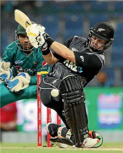  ?? PHOTOSPORT ?? Colin Munro swings to the leg side during his 58 off 42 balls against Pakistan. After Munro’s dismissal, the wheels fell off New Zealand’s batting effort.