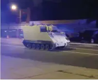 ?? Reuters ?? An armoured personnel carrier, which was purpotedly stolen, drives along a street in Richmond, Virginia, on Tuesday. —