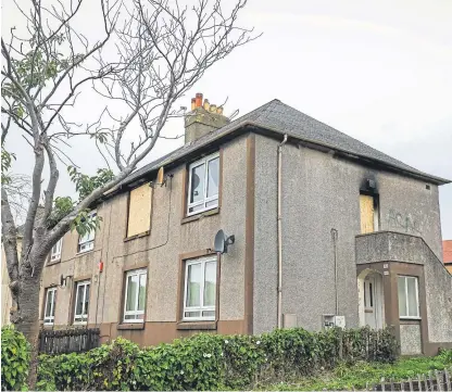  ?? Picture: Steven Brown. ?? The scorched and boarded-up property in Den Walk.