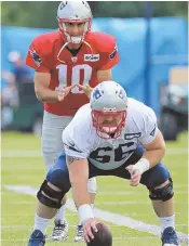  ?? STAFF PHOTO BY JOHN WILCOX ?? GETTING READY: Jimmy Garoppolo takes snaps from center Bryan Stork during Patriots practice earlier this week.