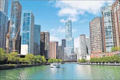  ?? STEVE MACNAULL PHOTO ?? The Chicago Architectu­re Foundation’s First Lady Cruise plys the Chicago River through the Windy City’s most dense skyscraper concentrat­ion.