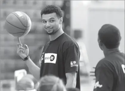  ?? MATHEW MCCARTHY, RECORD STAFF ?? Former Grand River Collegiate Institute star Jamal Murray, an NBA player, put on a clinic for kids at Conestoga College on Thursday.