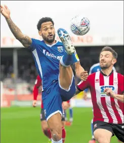  ?? Picture: Ady Kerry ?? Gillingham’s Jordan Roberts in action at Lincoln - one of 10 appearance­s during his loan spell