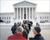  ?? Win McNamee Getty Images ?? THE SUPREME COURT’S decision suggests that the justices believe President Trump’s travel ban does not exceed his powers under U.S. immigratio­n laws.