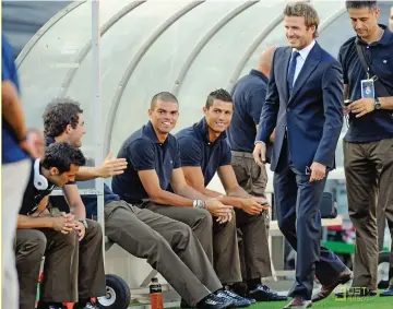  ?? Photo: Business Insider ?? Cristiano Ronaldo (sitting third from left) meets David Beckham (standing second from right).