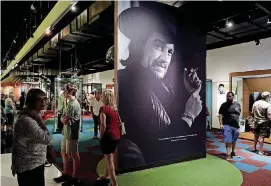  ?? [AP PHOTOS] ?? In this May 25 photo, a portrait of Waylon Jennings is displayed as part of the Outlaws & Armadillos exhibit at the Country Music Hall of Fame and Museum in Nashville, Tennessee.