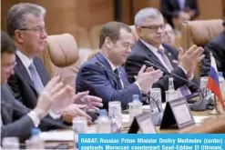  ??  ?? RABAT: Russian Prime Minister Dmitry Medvedev (center) applauds Moroccan counterpar­t Saad-Eddine El Othmani, during a meeting of the Moroccan and Russian officials in Rabat, Morocco yesterday.—AFP