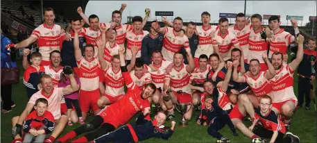  ??  ?? Kilanerin celebrate after capturing the Intermedia­te football championsh­ip title for the third time on Sunday.