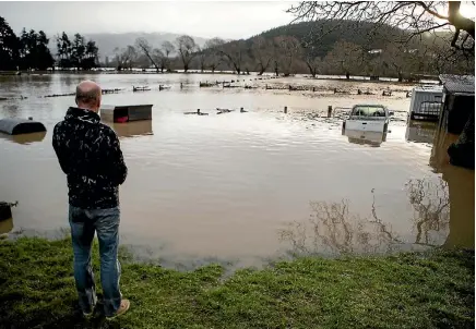  ?? PHOTO: GEORGE HEARD/STUFF ?? Flooding in the South Island led to states of emergency being declared in Otago and Canterbury. Damages came to $31.2 million.