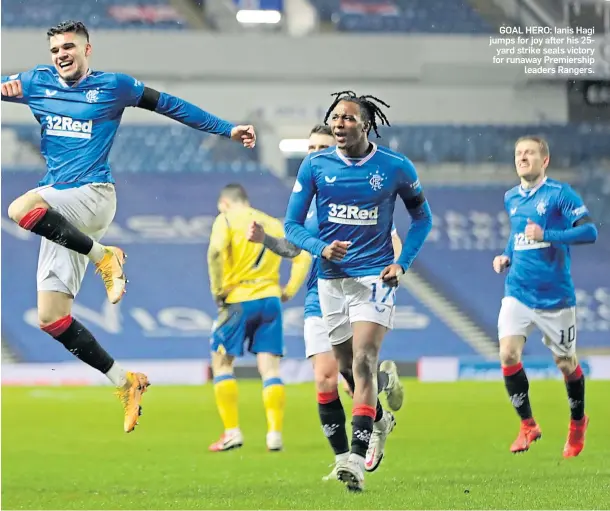  ??  ?? GOAL HERO: Ianis Hagi jumps for joy after his 25yard strike seals victory for runaway Premiershi­p leaders Rangers.