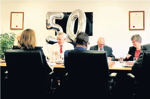  ?? Danny Lawson ?? > First Minister Carwyn Jones pictured at a Cabinet meeting yesterday on his 50th birthday