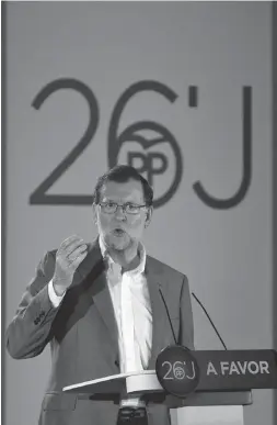  ?? Foto: Alberto Estevez, dpa ?? Mariano Rajoy mit „Dafür“-Wahlmotto.