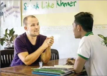  ?? SUPPLIED ?? Walker Hedgepath studies the Khmer language at Be like Khmer in Siem Reap.