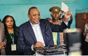  ?? Ben Curtis / Associated Press ?? President Uhuru Kenyatta casts his vote Thursday in his hometown of Gatundu, Kenya. The country is holding a rerun of its disputed presidenti­al election.