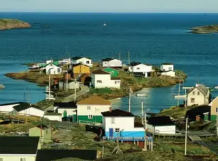  ?? JEAN-PIERRE HUARD/LE QUÉBEC MARITIME ?? A sunny day in Harrington Harbour, where life moves by foot, sea and ATV.