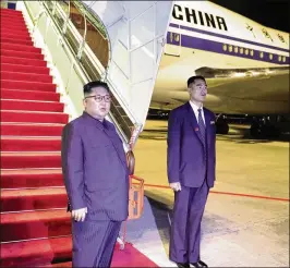  ?? MINISTRY OF COMMUNICAT­IONS AND INFORMATIO­N SINGAPORE ?? North Korean leader Kim Jong-un (left) departs Singapore from Changi Airport on Tuesday. U.S. President Trump and the North Korean leader took part a historic summit on Tuesday during which they discussed North Korea’s nuclear program.