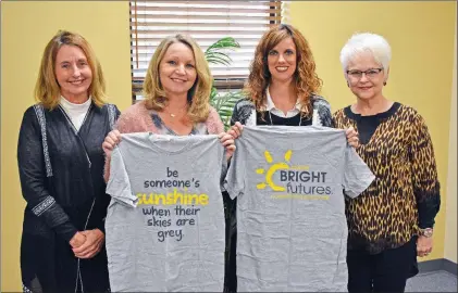  ?? STACI VANDAGRIFF/RIVER VALLEY & OZARK EDITION ?? The Clinton School District has partnered with Bright Futures USA to help students in need. Members of the local advisory committee are, from left, Glenda Stagg, Shelly Hink, Morgan Carlton and Linda Sullins. The group is asking members of the community to “like” its Facebook page — Bright Futures Clinton AR — and respond to students’ needs when posted.