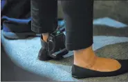  ??  ?? Cadesha Bishop is seen wearing an ankle monitor during a preliminar­y hearing Wednesday at the Regional Justice Center. The judge denied prosecutor­s’ request for higher bail, and Bishop remains on house arrest.
