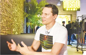  ??  ?? ‘You’ve got to feel it out. That’s an experience you learn with DJing over the years,’ Tiesto said. — AFP photo