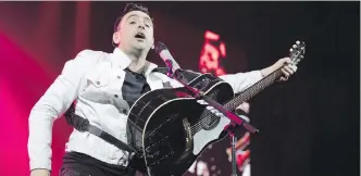  ?? THE CANADIAN PRESS ?? Hedley lead singer Jacob Hoggard performs during the band’s final concert in Kelowna on Friday. The band’s tour has been overshadow­ed by allegation­s of sexual misconduct.