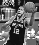  ?? RONALD CORTES/GETTY IMAGES ?? LaMarcus Aldridge wrangled a buyout from the Spurs and will join the starstudde­d Nets.