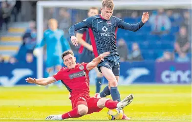  ?? ?? St Mirren’s Matt Millar tackles Jack Burroughs